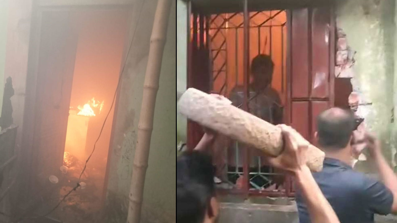 বসতঘরে আগুন, দেয়াল ভেঙে স্কুলছাত্রকে বাঁচালেন স্থানীয়রা